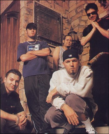 Limp BizKit- 
DJ Lethal/bass Sam Rivers/drummer John Otto/guitar Wes Borland/ FRED DURST